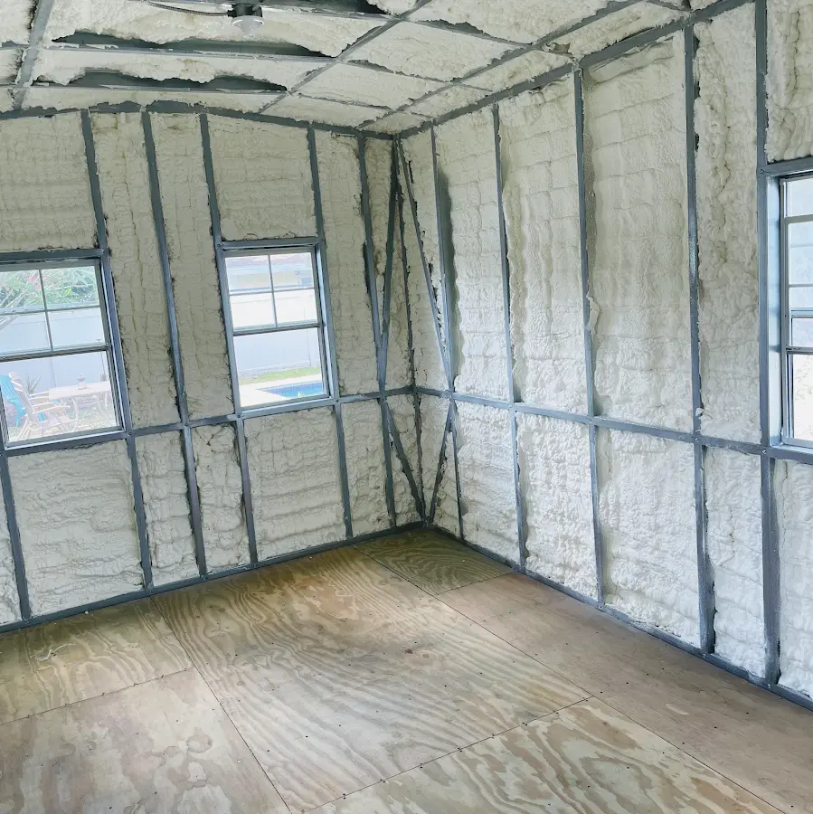 Closed-cell spray foam insulation applied to wall cavities in a residential project in Schererville